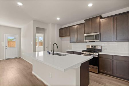 This kitchen is not only a functional space but also has ample storage. Whether you're a seasoned chef or just love to gather and enjoy good food, this kitchen is a dream come true.