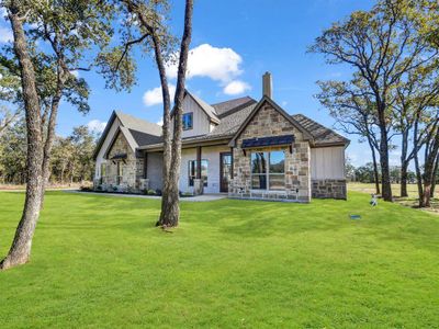 New construction Single-Family house 136 Prairie Winds Drive, Poolville, TX 76487 - photo 1 1