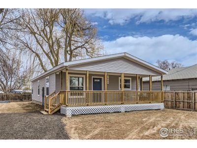 New construction Single-Family house 1609 Cherry St, Milliken, CO 80543 - photo 0