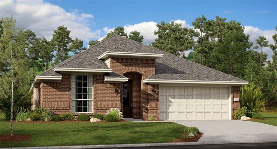 View of front of home with a garage and a front yard