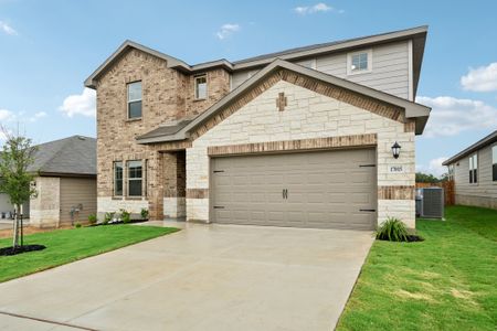 Front exterior of the Kessler floorplan at a Meritage Homes community. Front exterior of the Kessler floorplan at a Meritage Homes community.