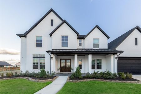 The double front entry enhances curb appeal and warms you into a world of refined living.