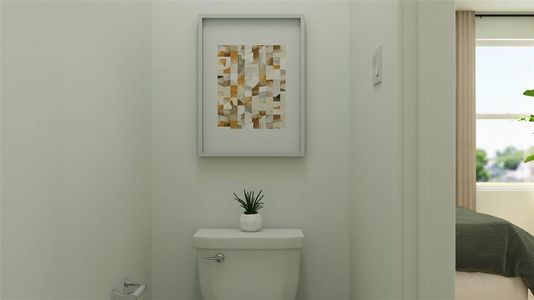 Bathroom with a healthy amount of sunlight and toilet