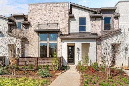 New construction Townhouse house 19810 Travis County Way, Cypress, TX 77433 - photo 0