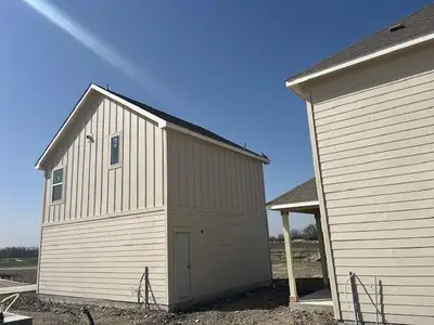 View of home's exterior featuring board and batten siding