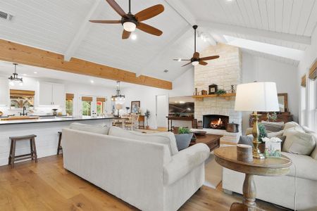 Main living space in home number one opens to the kitchen and dining space.