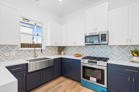 Custom designed kitchen with Quartz countertops