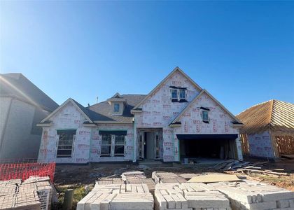 One-story home with 4 bedrooms, 2.5 baths and 3 car tandem garage