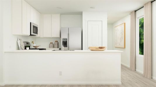 Kitchen with white cabinetry, light hardwood / wood-style flooring, white refrigerator with ice dispenser, kitchen peninsula, and range