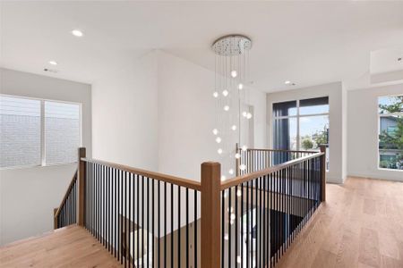 Top down view of the entry way with unique andluxury chandelier