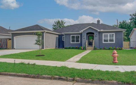 This stucco home is teeming with the latest upgrades