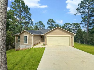 New construction Single-Family house 159 Kamaiki Dr, Bastrop, TX 78602 - photo 0