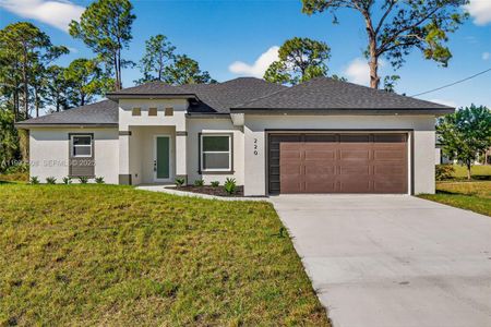 New construction Single-Family house 220 Lomax Ave, Lehigh Acres, FL 33974 - image