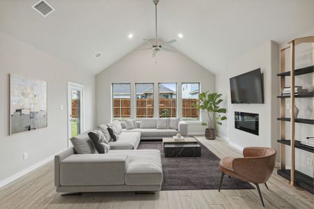 Living Room in the Claret home plan by Trophy Signature Homes – REPRESENTATIVE PHOTO