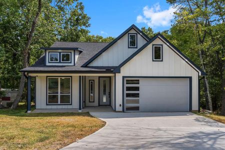 New construction Single-Family house 90 Piping Rock Place, Coldspring, TX 77331 - photo 0