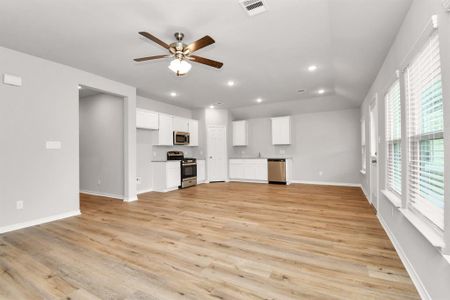 Open-concept living makes this family room feel comfortable and spacious.