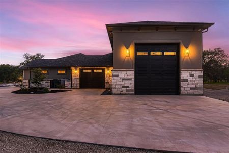 Garages include a 22' x 45' x 18' RV garage complete with RV hook-ups; an 18' x 30' garage, and a 15' x 20' garage.