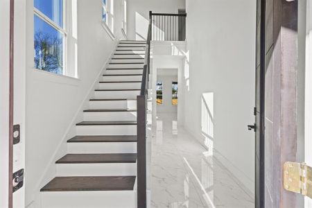 Staircase with a high ceiling