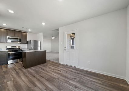 The dining room of the Sabine plan is right off of the kitchen.