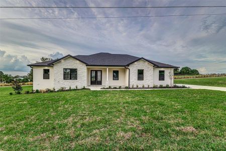 New construction Single-Family house 1001 Cody Bluffs Road, Babson Park, FL 33827 - photo 0