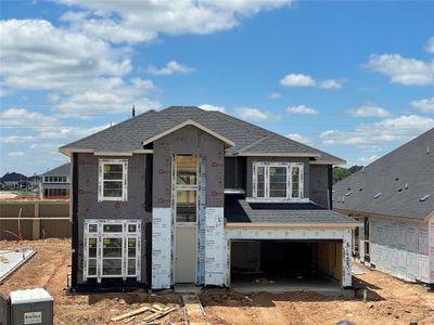 Elevated View of the Brick & Stucco Masterpiece