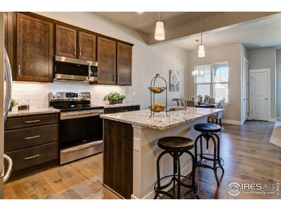 New construction Townhouse house 4177 Trapper Lake Drive, Loveland, CO 80538 - photo 0