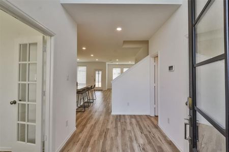 Enter into a light and spacious foyer.