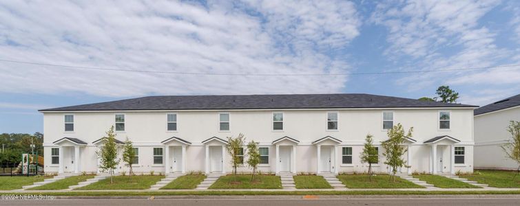 New construction Townhouse house 8510 Mcgirts Village Lane, Jacksonville, FL 32210 - photo 0