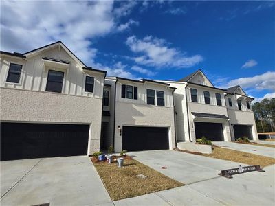 New construction Townhouse house 1941 Westwind St, Lawrenceville, GA 30043 - photo 0