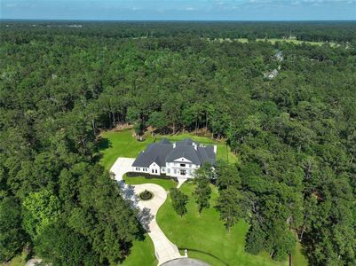 An aerial view of this fabulous property and the beautiful woods surrounding it!