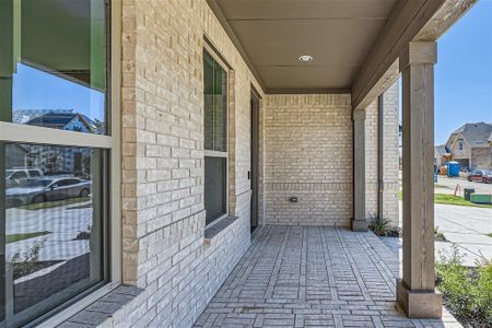 View of patio with a porch