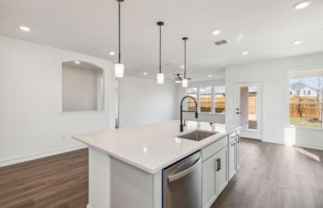 Spacious kitchen with large windows *real home pictured