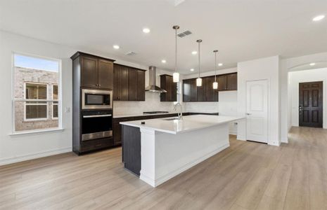 Spacious kitchen with ample cabinet space *real home pictured