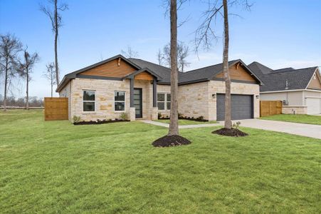 Beautiful stone and wood-accented facade on a 14,000 sq. ft. lot