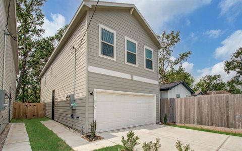 Beautiful new construction with side entry front door, private driveway & 2 car garage! (photo of neighboring home)