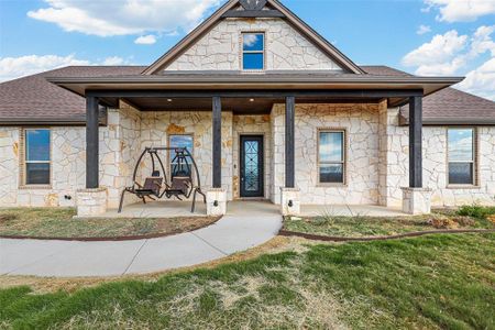 View of front of house with a front yard