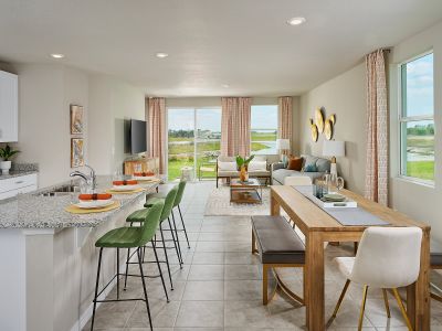 Kitchen and great room in Yellowstone model at Salt Meadows in Parrish.