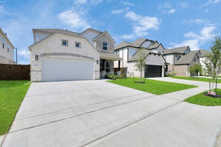 Home features a convenient 2-car garage complemented by a spacious driveway, offering ample parking for you and your guests.