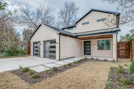 Contemporary house featuring a garage