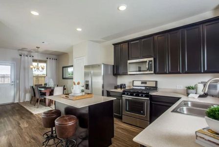 Photo of Pulte model home with same floor plan, not of actual home listed.