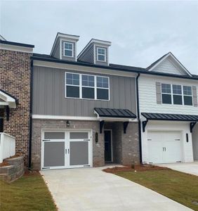 New construction Townhouse house 5326 Fox Den Road, Oakwood, GA 30566 Saxon- photo 0