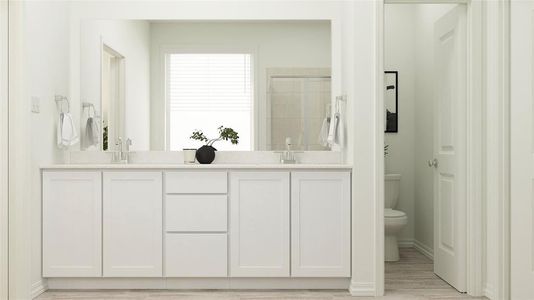 Bathroom featuring vanity, hardwood / wood-style floors, toilet, and tiled shower