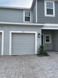 New construction Townhouse house 2711 Puffin Place, Davenport, FL 33837 - photo 0