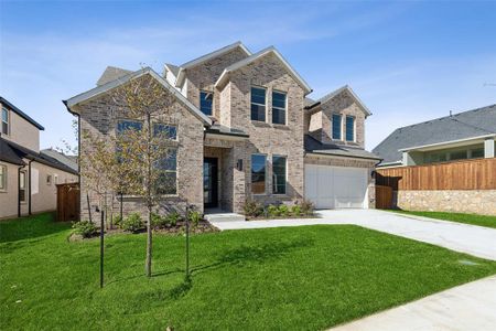 Sophisticated architectural details create great curb appeal in this dream home!