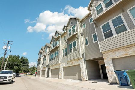 View of property with a garage