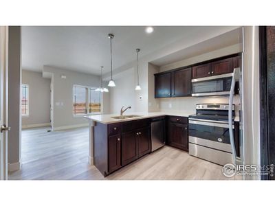 New construction Townhouse house 1741 Westward Cir, Unit 3, Eaton, CO 80615 - photo 0