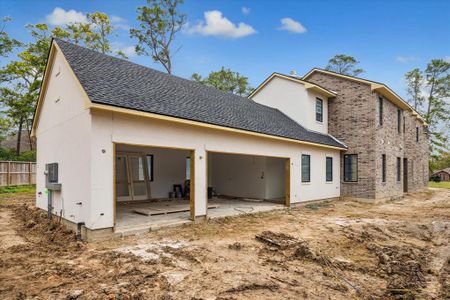 Three car oversized garage with entrance to the mud room, laundry and secondary office/study.