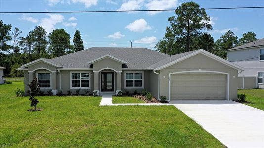 New construction Single-Family house 70 Sea Breeze Trail, Palm Coast, FL 32164 - photo 0