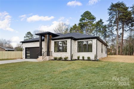 New construction Single-Family house 10614 Arlington Church Rd, Charlotte, NC 28227 - photo 0