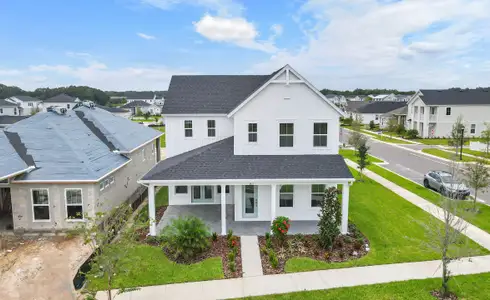 New construction Single-Family house 3611 Lajuana Blvd, Wesley Chapel, FL 33543 Poppy- photo 0